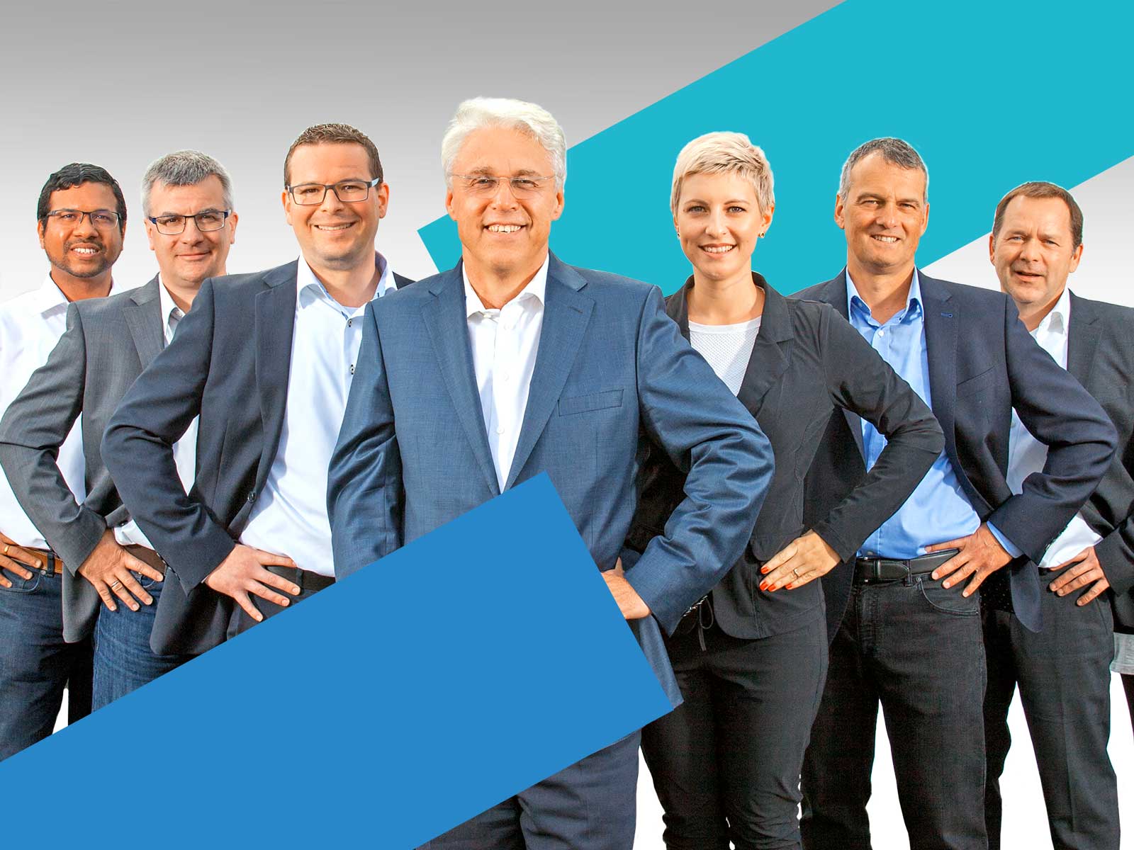 Seven Schildknecht AG team members in business attire - service, support and radio data transmission for the industry